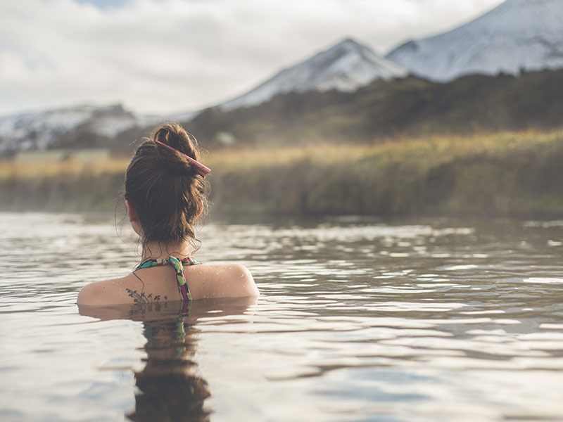 Girl in a hot spring in Iceland