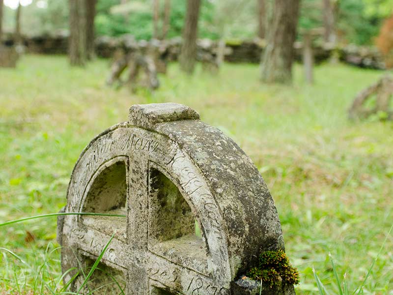 old stone wheel crosses in Vormsi graveyard in Estonia.